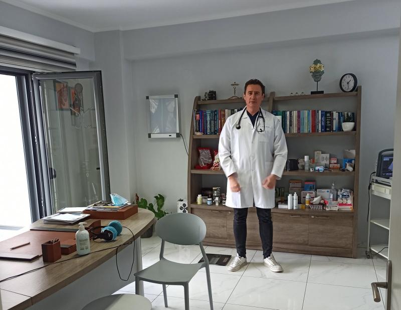 Dr. Hüseyin Baltacı in his private medical practice in Xanthi