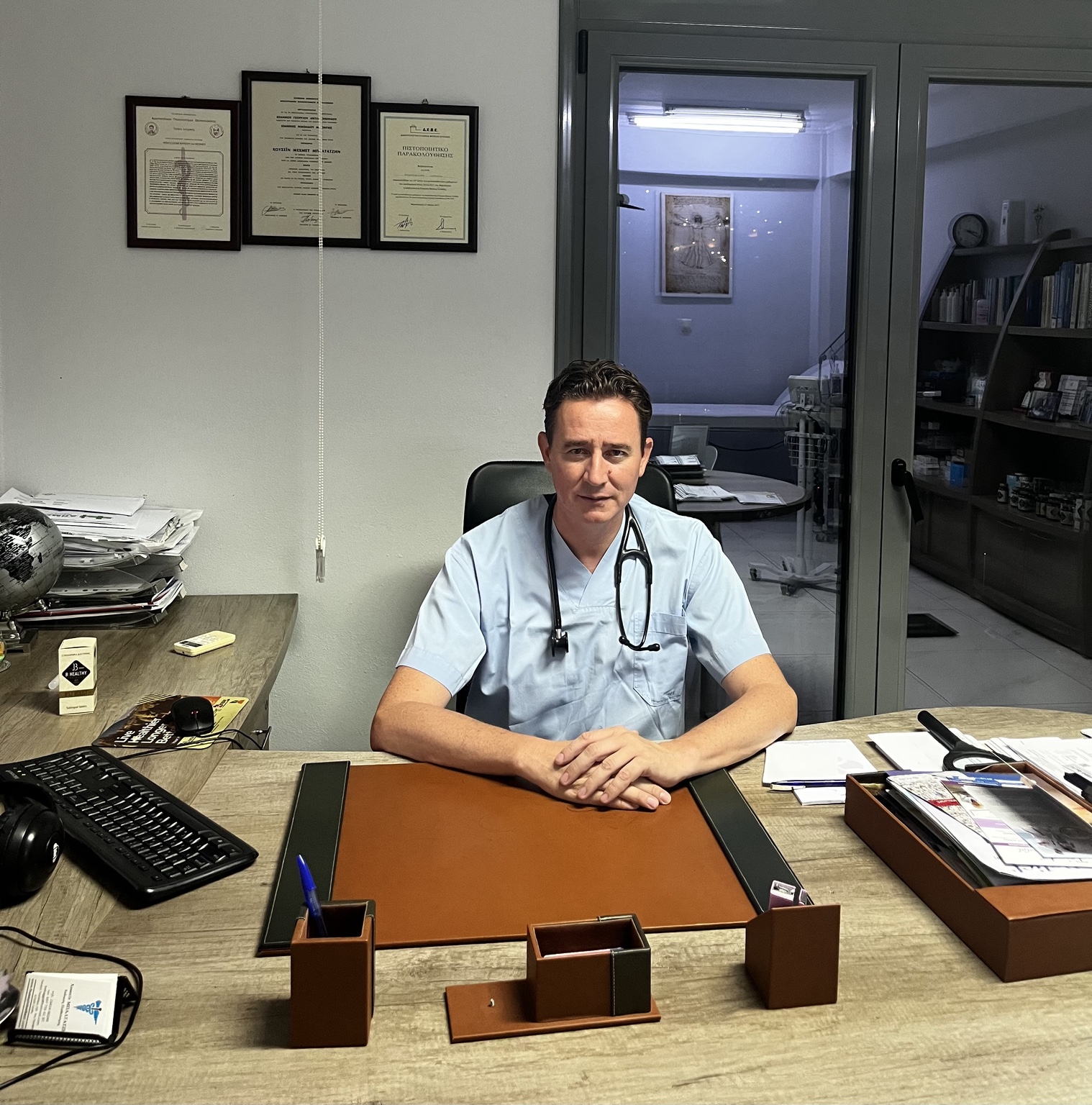 Dr. Hüseyin Baltacı in his medical practice